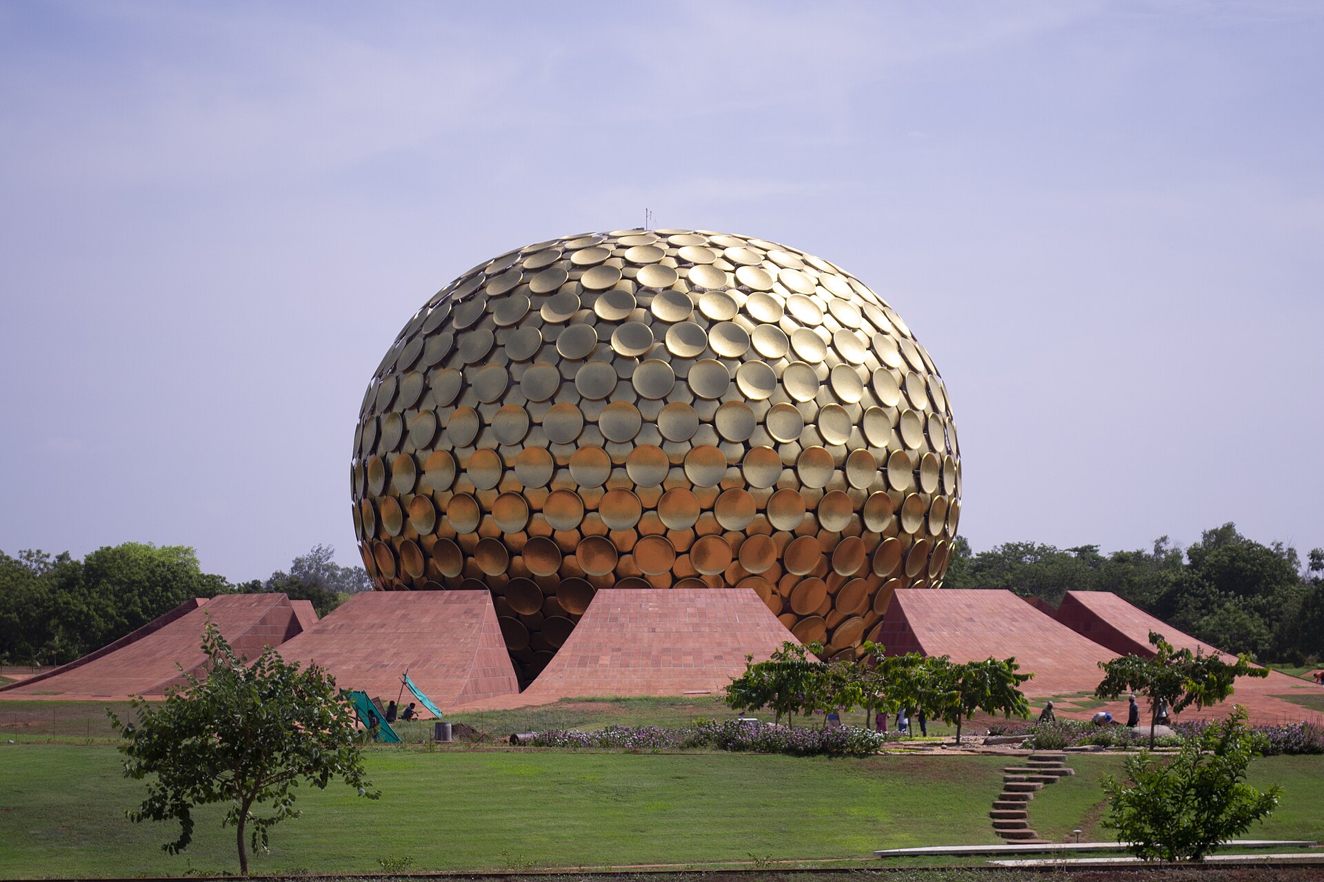 The golden-domed Matrimandir rising above lawns at Auroville near Pondicherry