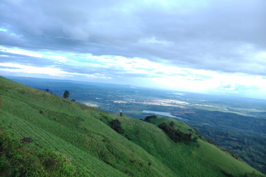 Chikkamagaluru town and plains seen far below from Mullayanagiri