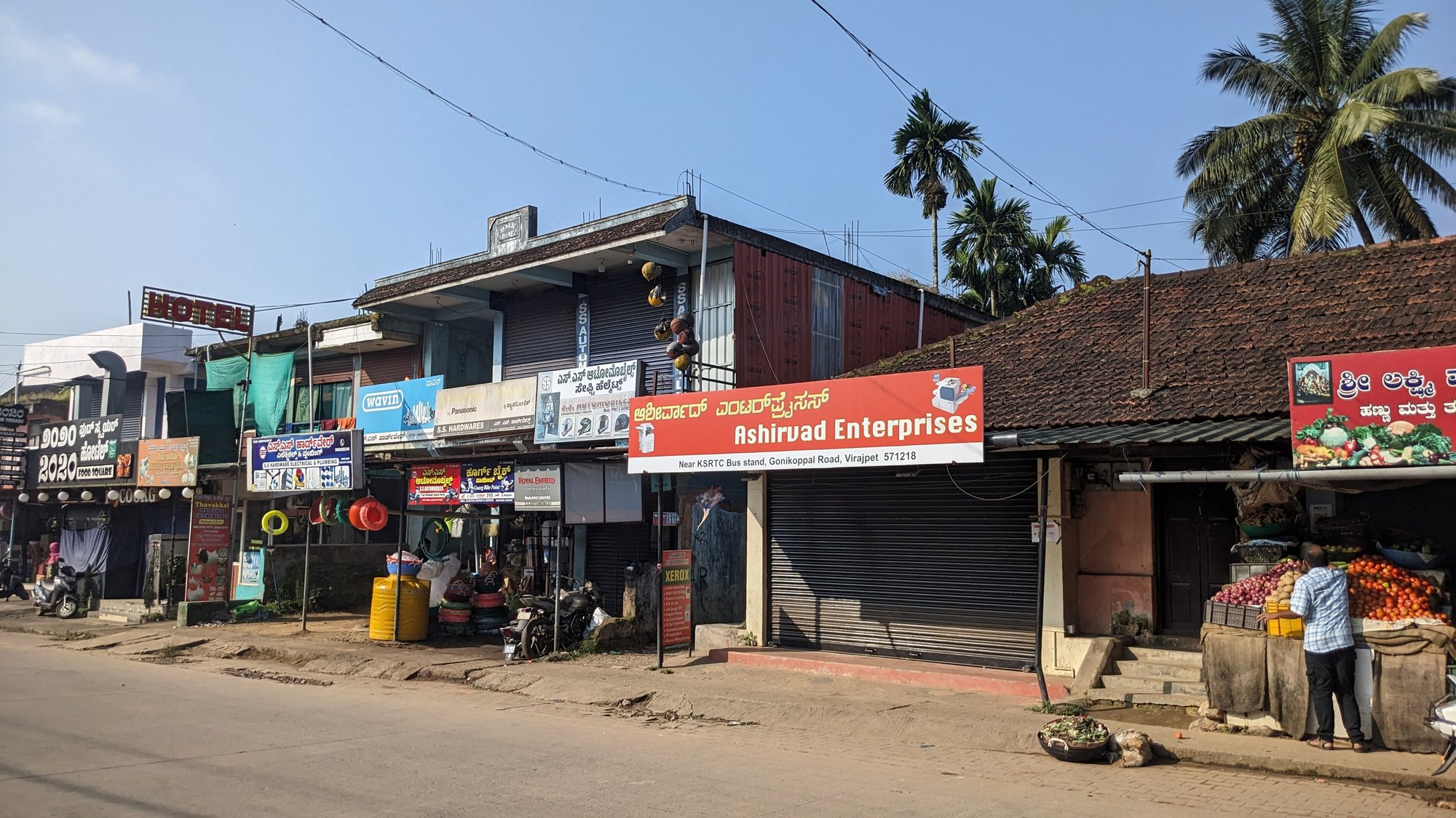 Busy roadside shops in a Kodagu town