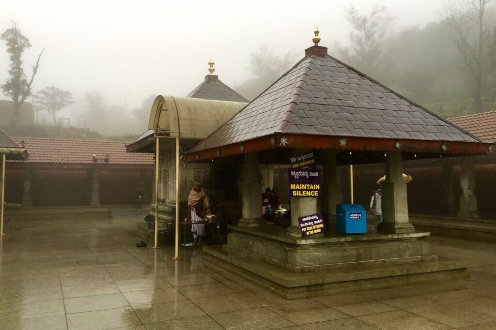 Talakaveri temple at the source of the Kaveri wrapped in monsoon mist