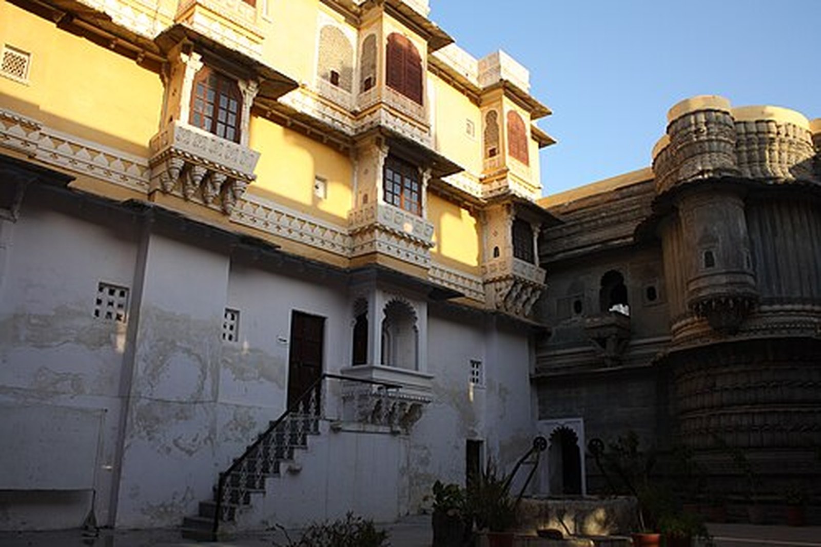 Ochre facade, balconies and stairway of Bagore Ki Haveli, Udaipur
