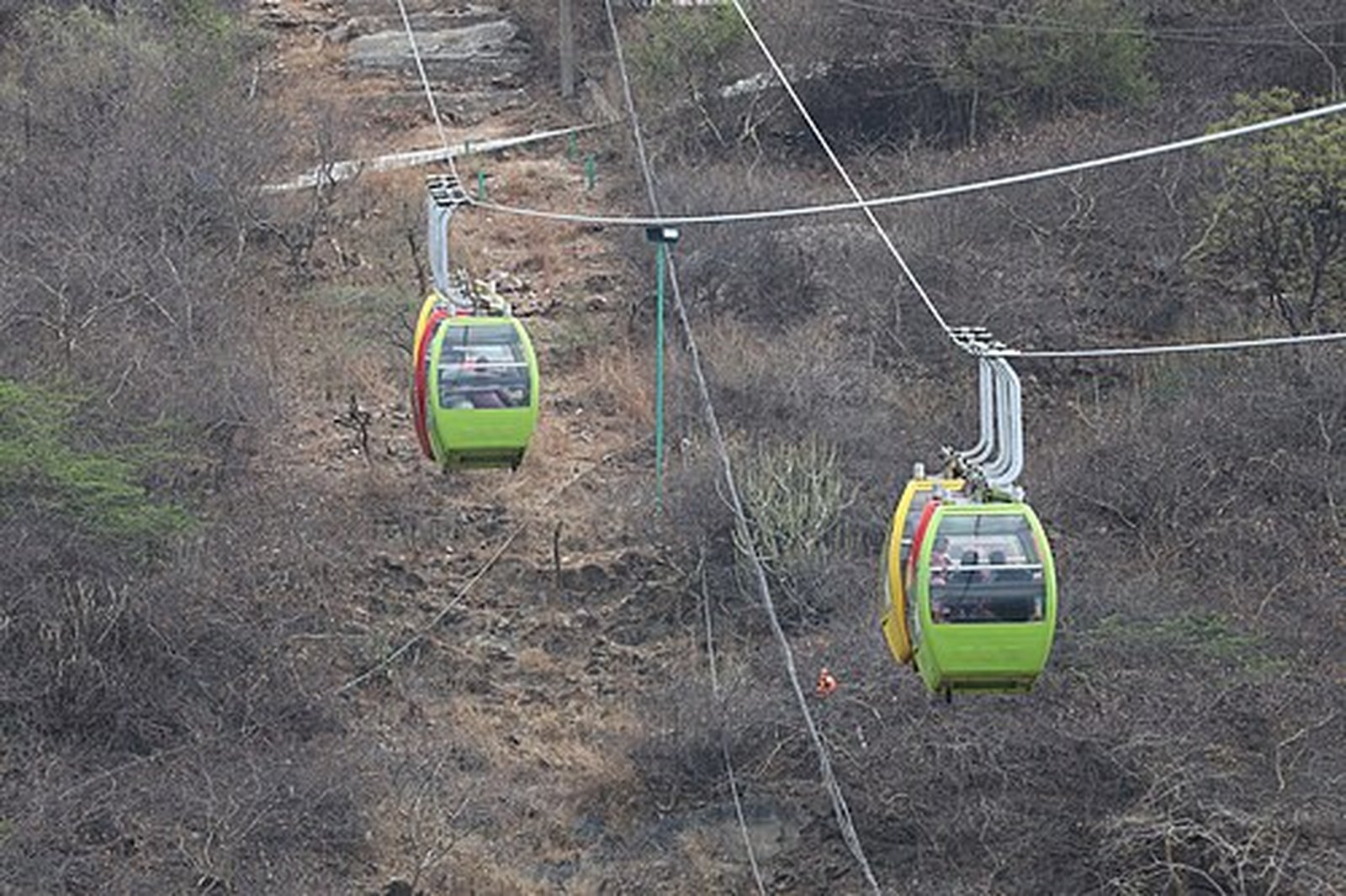Cable cars of the Karni Mata ropeway climbing above Doodh Talai, Udaipur