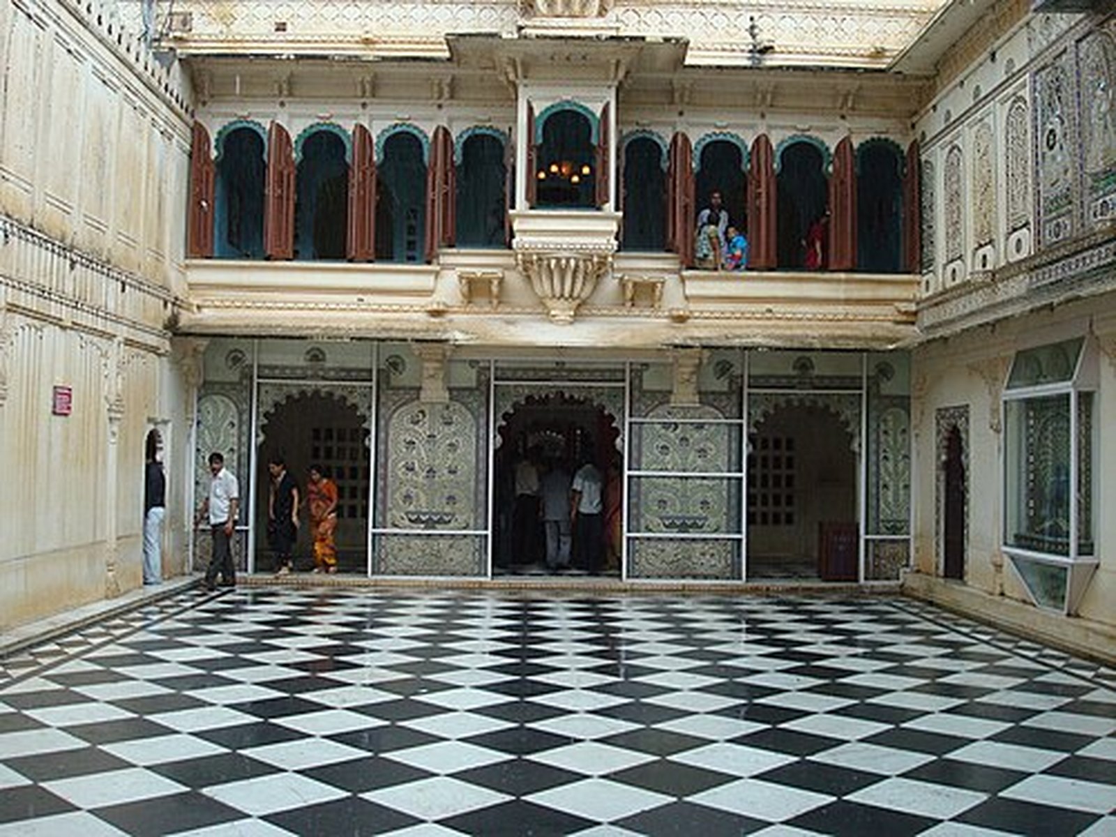 Light and shadow in the checkered Mor Chowk courtyard, City Palace Udaipur