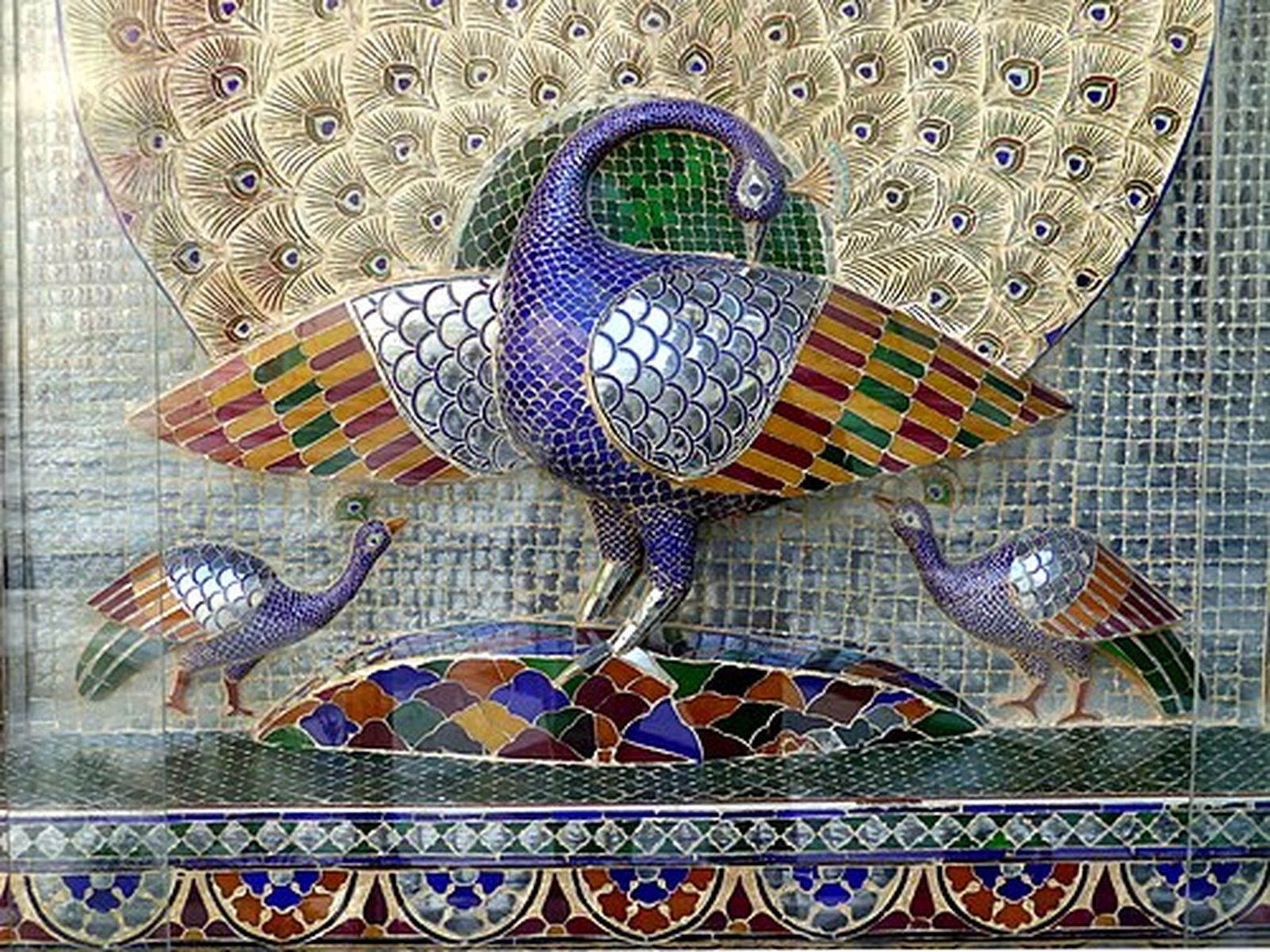 Glass-mosaic peacock in the Mor Chowk courtyard of the City Palace, Udaipur