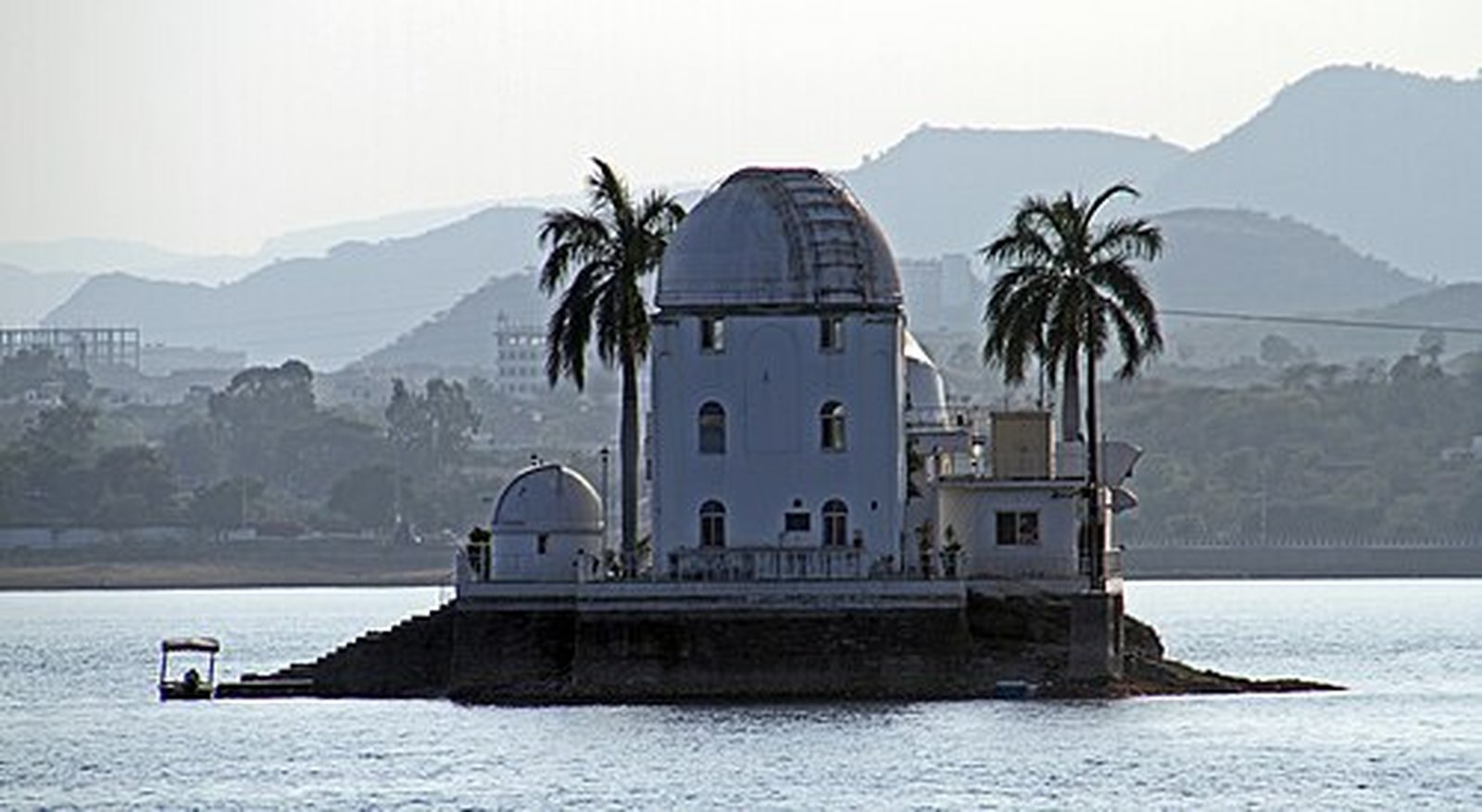 Nehru Park island pavilion with palms on Fateh Sagar Lake, Udaipur