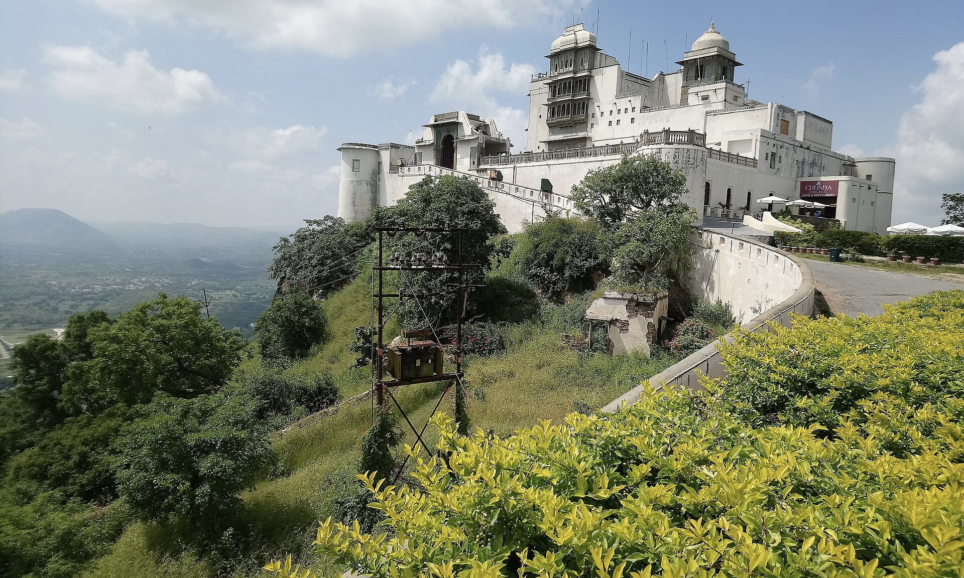 Sajjangarh Monsoon Palace on its forested hilltop above Udaipur